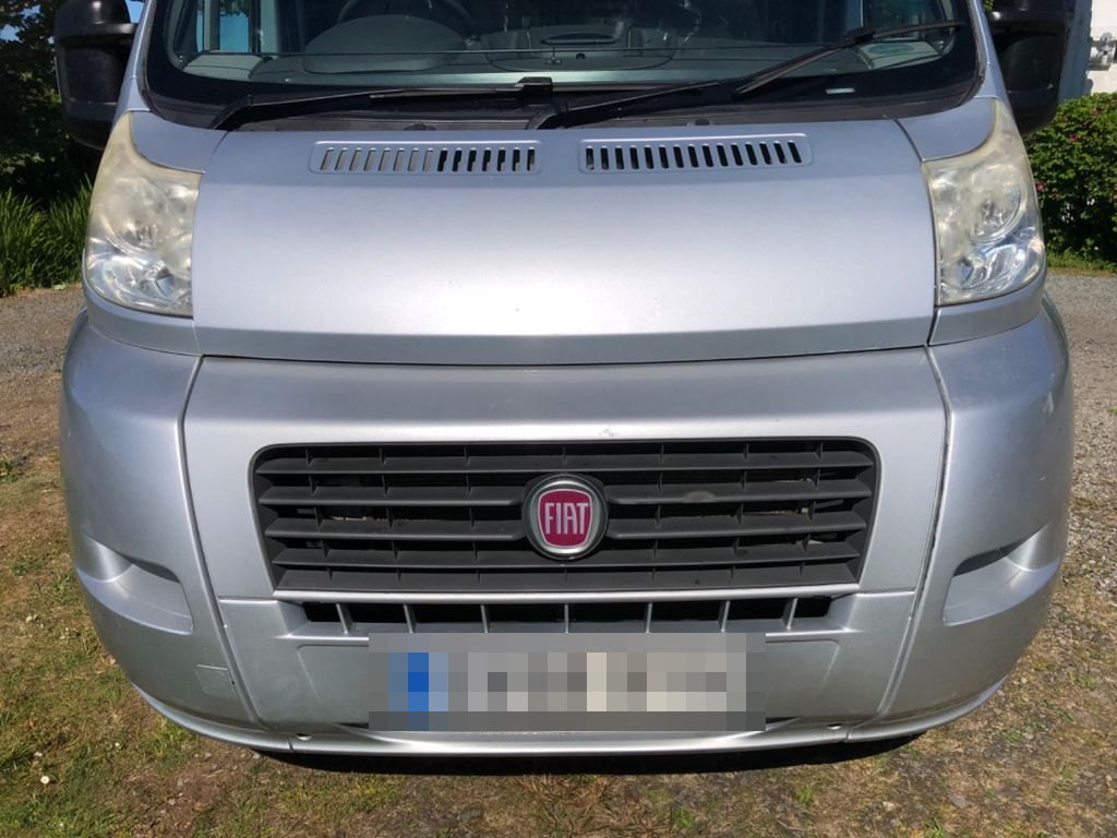 Front view of the silver Autocruise Rhythm on its Fiat Ducato base, with the Fiat grille badge (number plate digitally obscured)