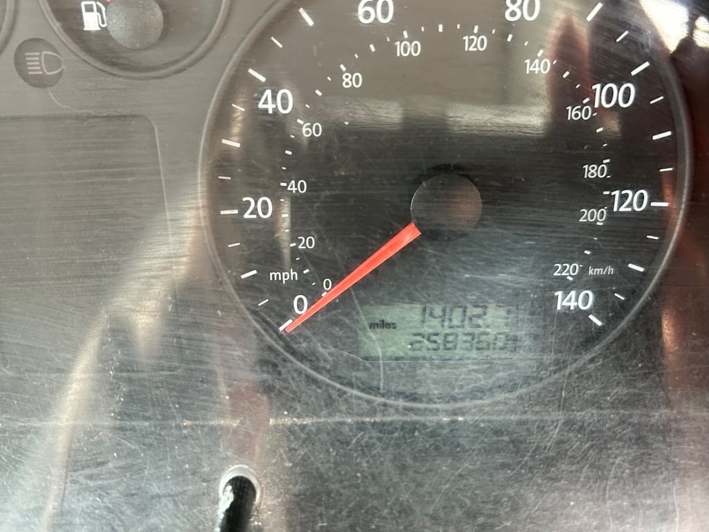 The instrument cluster of a Volkswagen Transporter, the odometer reading 258,360 miles with a trip of 1,402.7