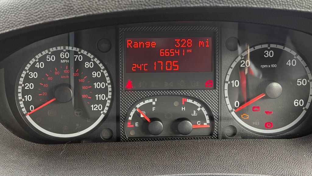 The campervan's instrument cluster photographed showing an odometer reading of 66,591 miles