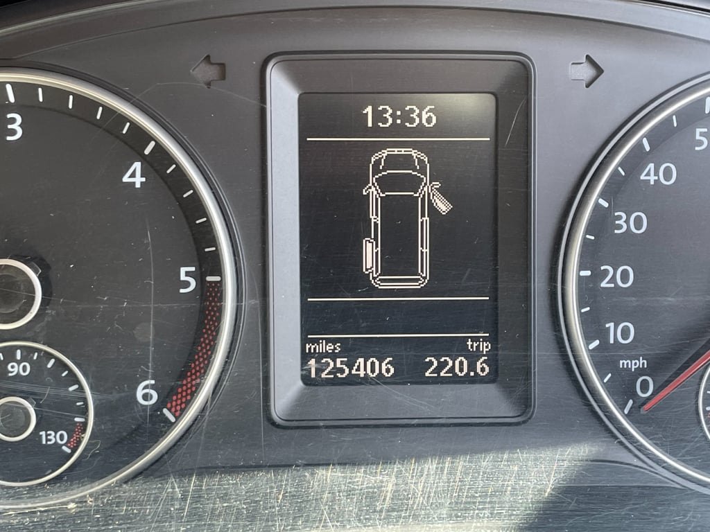 The Transporter's instrument cluster showing an odometer reading of 125,406 miles